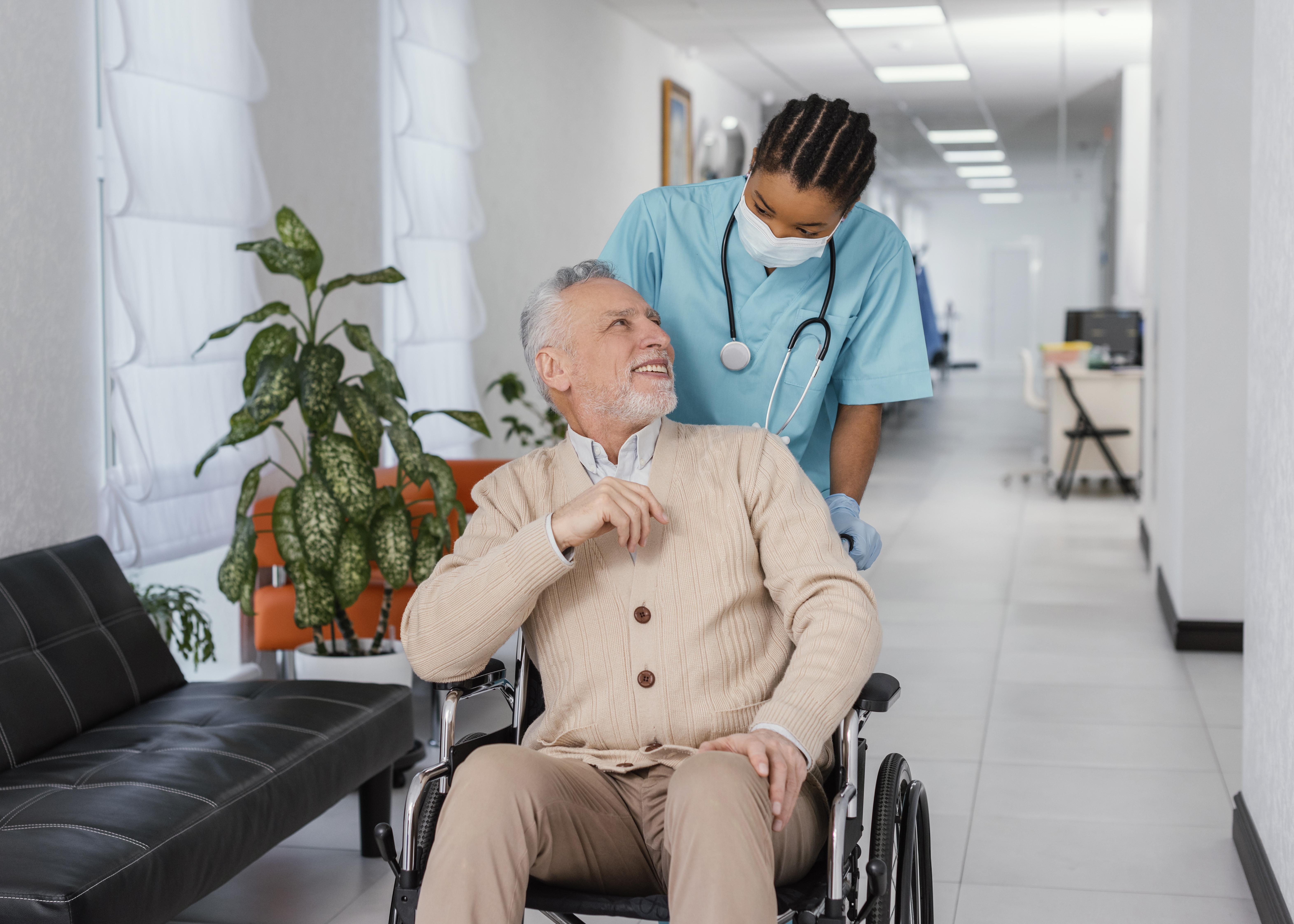 Care hero - healthcare professional with elderly patient